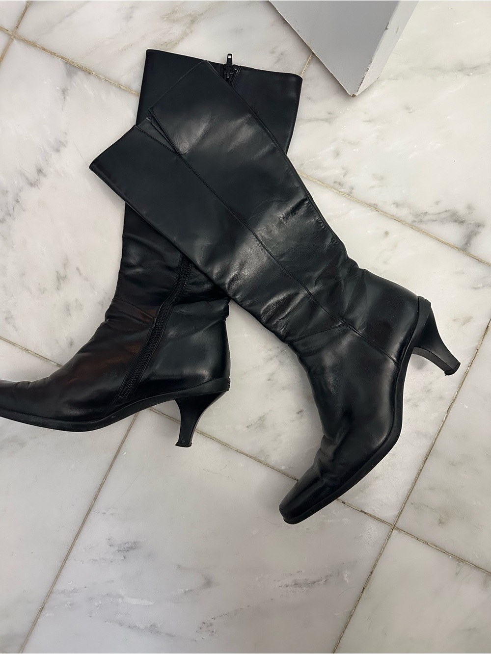 Knee high black boots
